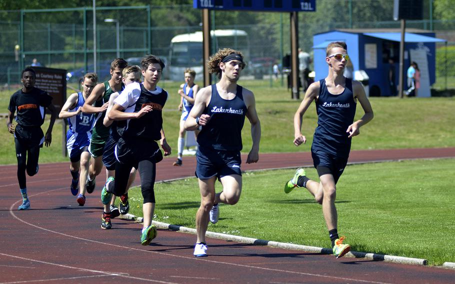 High school athletes begin the first lap of a 1,600-meter run during a track meet at RAF Lakenheath, England, Saturday, May 19, 2018. Lakenheath's Dom Scifo beat his best time with a 4 minute, 45 second first place finish.