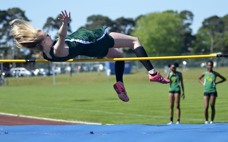 Alconbury's Marrisa Kastler floats over a high jump bar set to 4 feet, 7 inches during a high school track meet at RAF Lakenheath, England, Saturday, May 19, 2018. Kastler finished the day with second in high jump and first place in long jump and 200-meter dash.