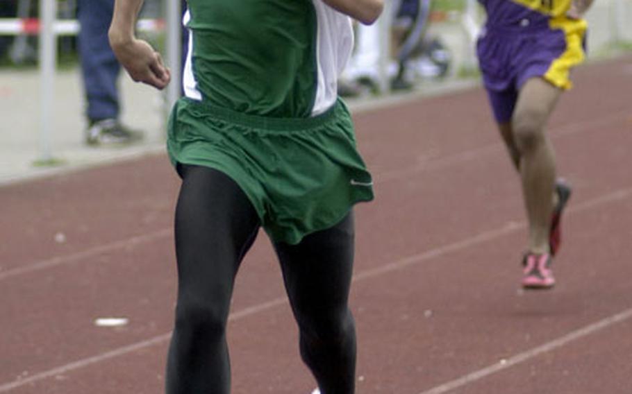 SHAPE&#39;s Brandon Glenn, left, races to the finish line to win the 200-meter dash with a time of 24.9 seconds at a DODDS track meet in Mannheim, Germany. Glenn is expected to challenge this year at 400 meters, the high jump and long jump.