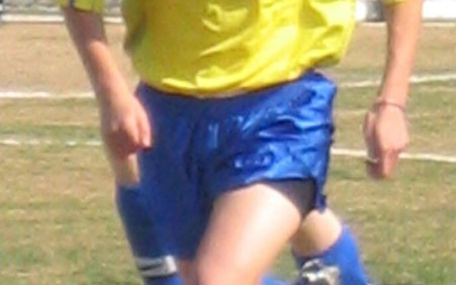 Junior Brieanna Carroll of the Pusan American Panthers dribbles the ball during Friday&#39;s Korean-American Interscholastic Activities Conference girls soccer match with Seoul American at Camp Hialeah, Pusan, South Korea. Carroll scored the game&#39;s only goal as the Panthers beat the Falcons 1-0 for the first time in school history.