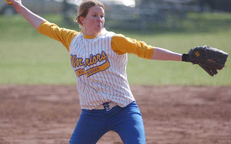 Wiesbaden&#39;s Melissa Mueller winds up for a pitch during a DODDS softball game against Hanau in Wiesbaden, Germany, on Saturday.