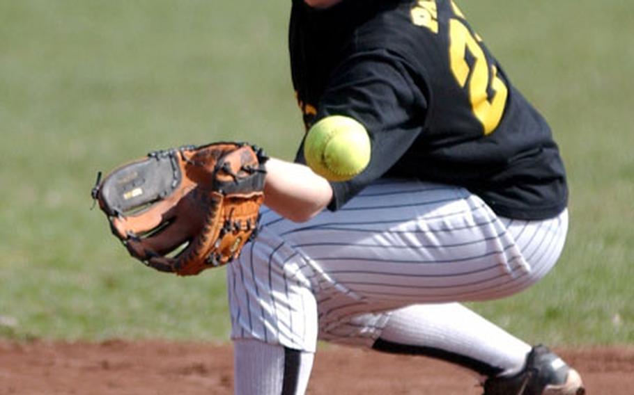 Hanau shortstop, Chassity Pellegrino, stabs at a grounder during a DODDS softball game against Wiesbaden in Wiesbaden, Germany, on Saturday.