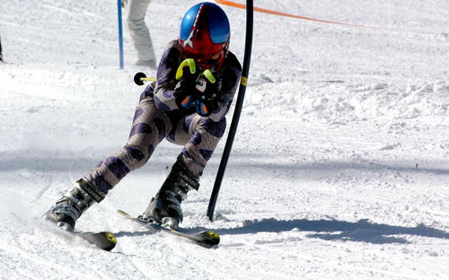 Bamberg skier Doran Logsdon, 12, clears the final gate on the slalom course Sunday on his way to the finish line.