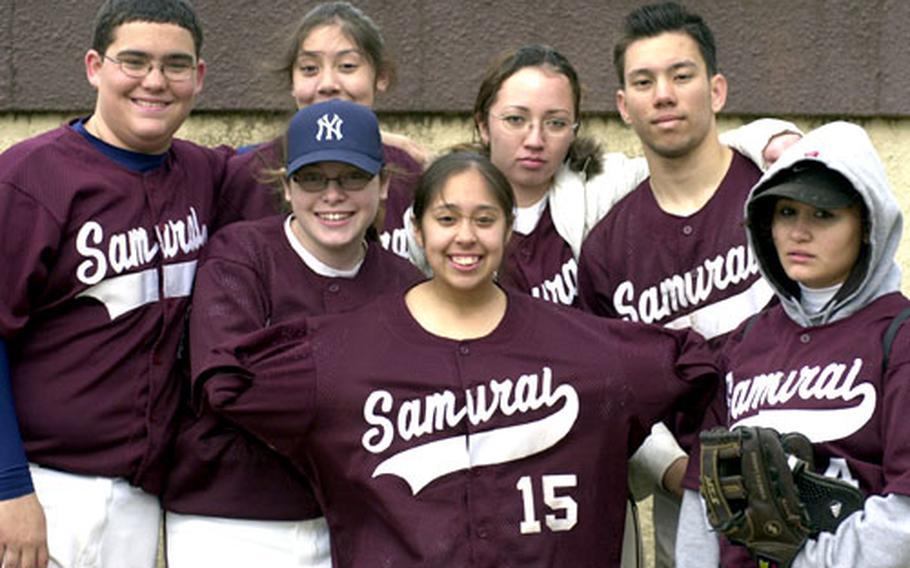 Baseball is where the boys and the girls are for the Matthew C. Perry Samurai this season. From left, team captain Neil Suther, Danielle Ortiz (top), Kjrsten Okland, Cynthia Ortiz, Lisa Garber, team captain Mike Menserado and Rebekka Claudio. Perry has five girls on its team this season.