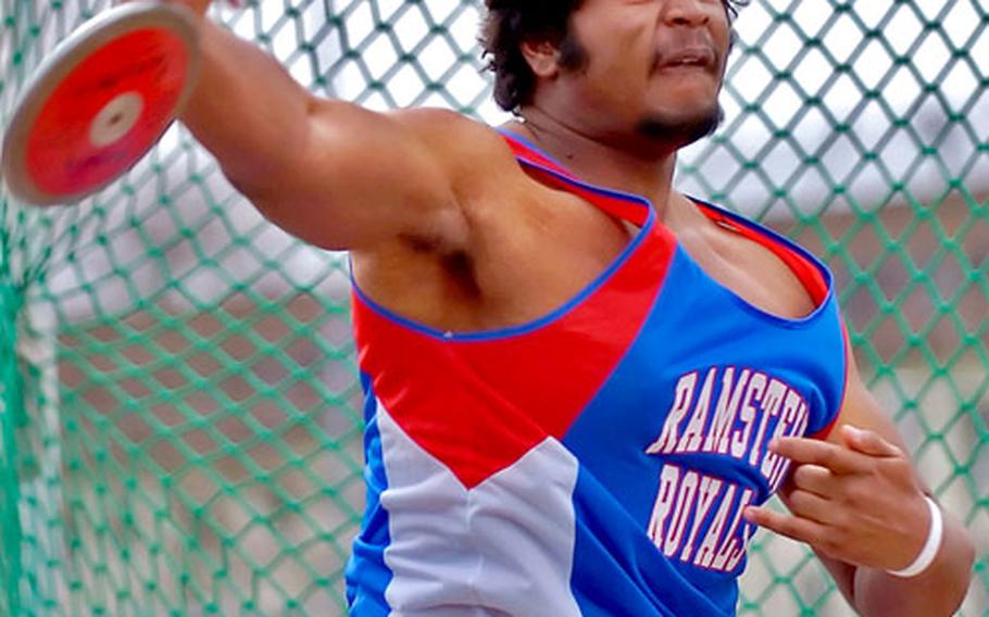 Ramstein&#39;s Willie Pierce hurls the discus during the opening weekend of the DODDS-Europe track and field season in Heidelberg, Germany, on Saturday.