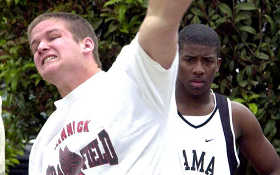 Nile C. Kinnick senior Joel Pettigrew swept the gold medals in the discus and shot put.