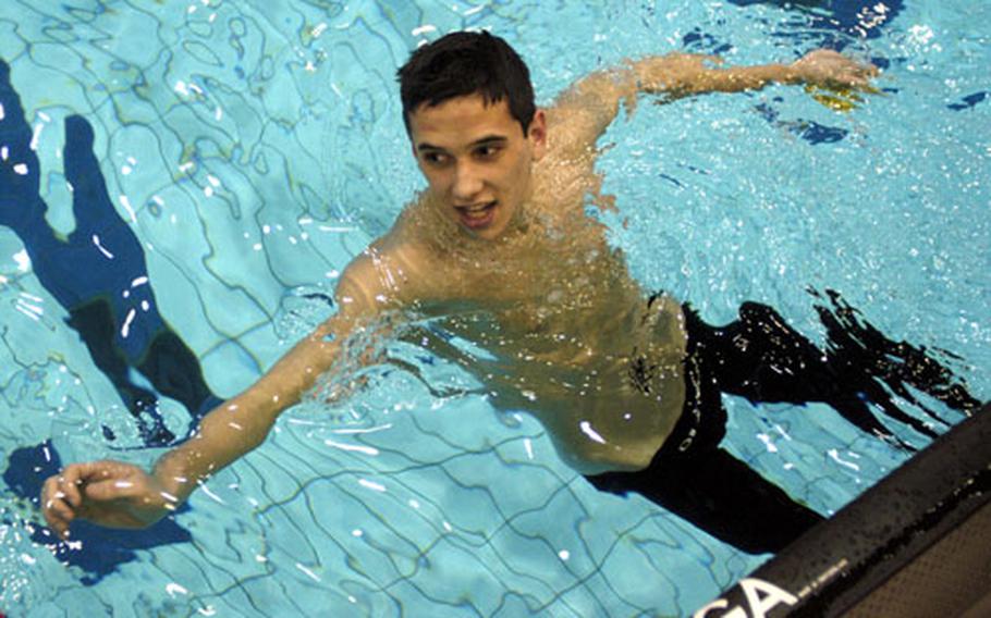 Marco Plebiscito of the SHAPE Seals takes a breather after capturing the 400 freestyle for boys ages 17-19 on Saturday at the European Forces Swim League Championships in Berlin. Plebiscito came from behind to win with a time of 4 minutes, 32.65 seconds. He won two events on the day.