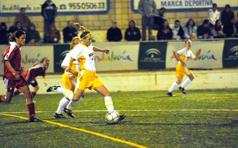 Navy midfielder CiAnna Weikle kicks the ball downfield during a scrimmage against U.D. Mairena in Seville, Spain, on Monday. The Navy Women’s Soccer Team is playing in Europe during the Naval Academy’s spring break. Mairena won the match with a 3-2 victory over Navy.