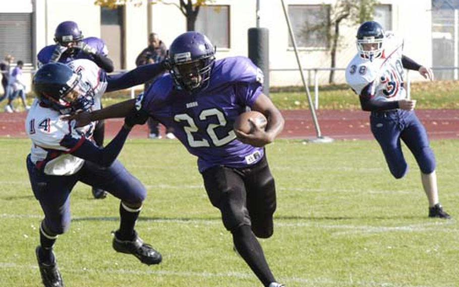 Mannheim junior Trevin Hampton breaks away from Bitburg&#39;s Cameron Jackson on a 42-yard run that was called back on a penalty. It was one of several tough plays for Mannheim, which lost 35-8 to Bitburg on Saturday.