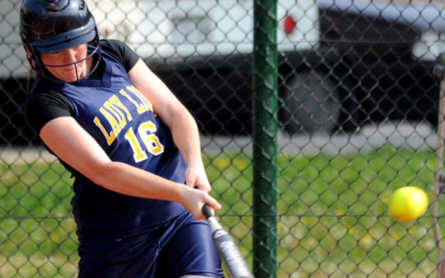 Heidelberg&#39;s Victoria Jackson connects for an RBI triple in the Lions&#39; 10-0 win against Mannheim on Saturday.