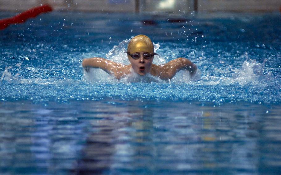 Sebastian Lunak, 8, with the NATO Marlins International Swim Team shows off his butterfly during the boys 8-and-under 100-meter individual medley at the 2011 European Forces Swim League championships at Eindhoven, Netherlands.