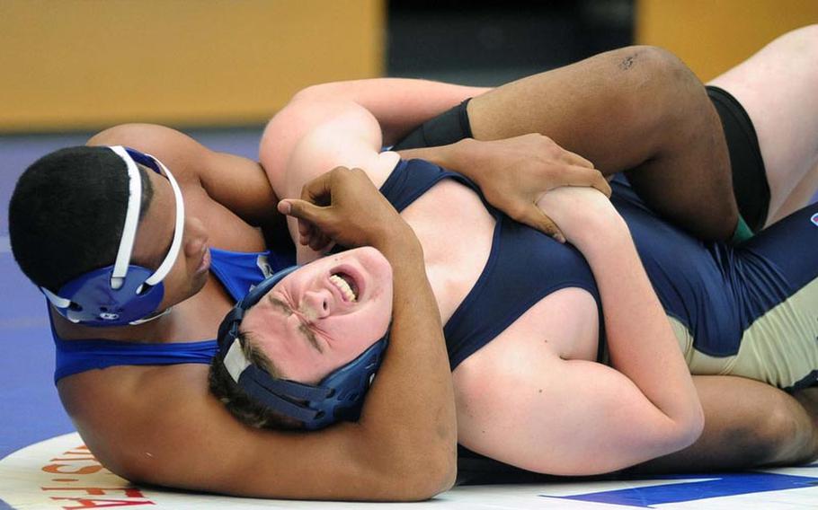 Rota's Anthony Davis has the advantage on Heidelberg's William Miller in their 220-pound match at the DODDS-Europe wrestling finals in Wiesbaden, Friday. Davis won with a fall at 5:28.