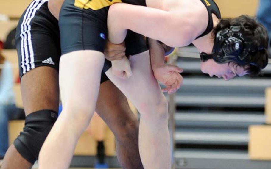 Vilseck's Isaiah McNickles, left, seems to have the advantage on Vicenza's Ramsey Schoeder in their 152-pound match at the DODDS-Europe wrestling championships, but Schoeder was able to turn the tables and win with a fall at 4:47.