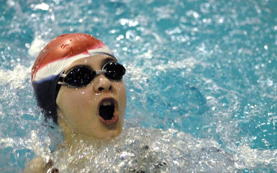 Gabriela Ousley-Naseman, 9, with the Stuttgart Piranhas, turns into the backstroke leg of the 100-meter Individual Medley Saturday at Eindhoven, Netherlands.  Ousley-Naseman took the top honors in the event for her age group with a time of 1:26.56.