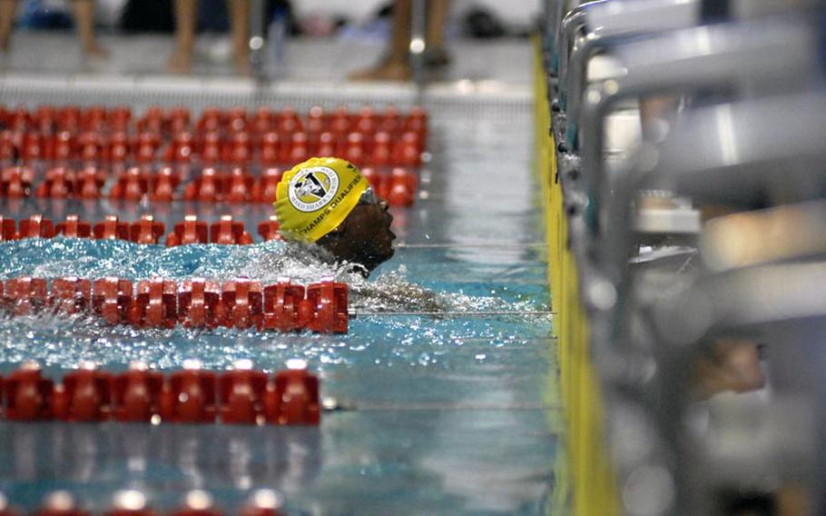 James Jones, 14, with the Vicenza Mako Sharks, finishes the 13-14 100-meter freestyle on Saturday during the European Forces Swim League championships at Eindhoven, Netherlands.  Jones won gold and shattered the existing league record by almost two seconds, finishing with a time of 56.41.