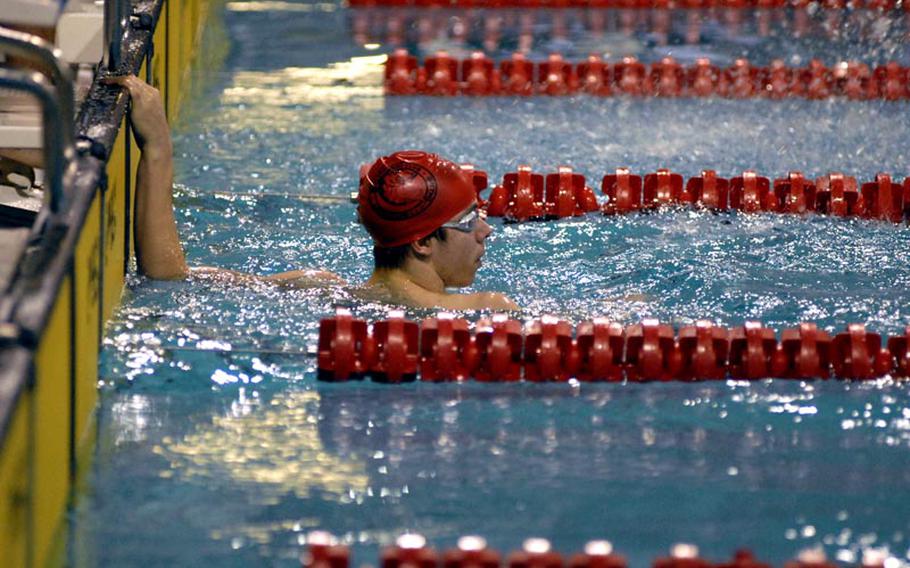 Kilian Korth, 16, from the Lakenheath Barracudas looks to see his final time following his gold medal performance in the boys 15-16 100-meter butterfly.  Korth's time of 1:02.74 was enough to outlast silver medalist Philipp Langhaeuser, 16, from the Berlin Bear-A-Cudas, who finished the race in 1:06.32.