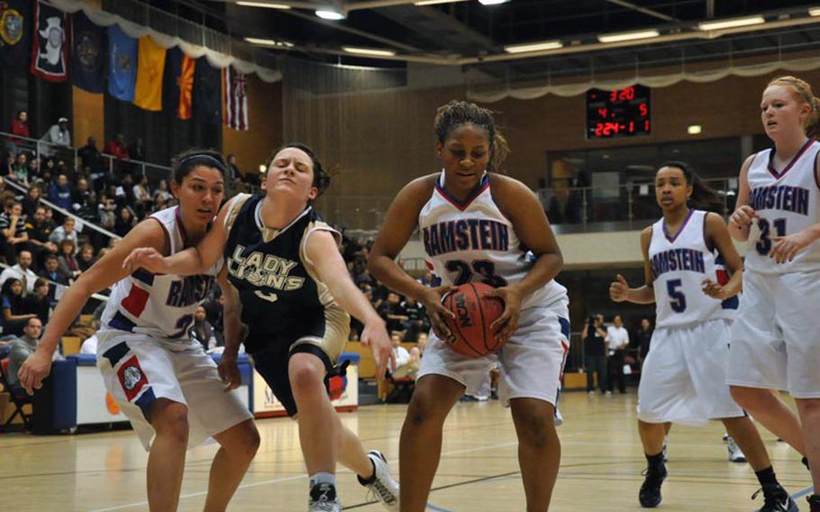 Ramstein's Jasmine Young grabs the ball from Heidelberg's Emma Roberts during the Division I championship game Saturday. Heidelberg won the game 32-31.