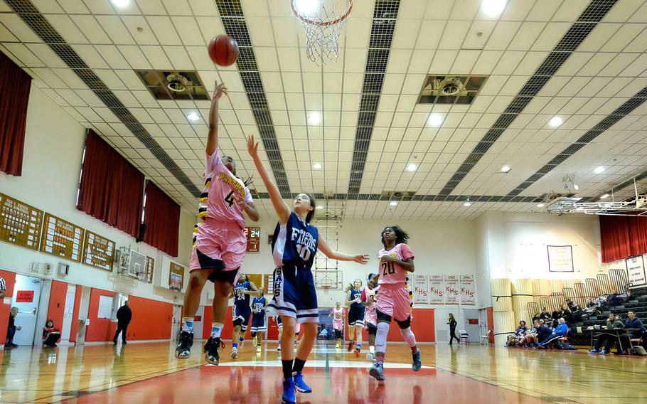 Kadena's Rhamsey Wyche beats Seoul American's Hannah Frederick down the court during Kadena's 53-24 round-robin victory Tuesday, Feb. 17, 2015, in the girls Division I Far East basketball tournament at Yokosuka Naval Base, Japan.