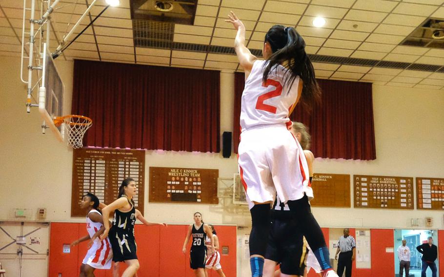 Nile C. Kinnick's Rhyssa Hizon launches a three-point shot against American School In Japan during round-robin play of the girls' Division I Far East Tournament at Naval Base Yokosuka, Japan on Tuesday, Feb. 17, 2015. Kinnick will meet ASIJ again in Wednesday's semifinal. 