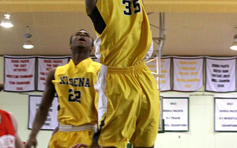 Kadena's Boysie Gordon dunks in a victory over Nile C. Kinnick.

