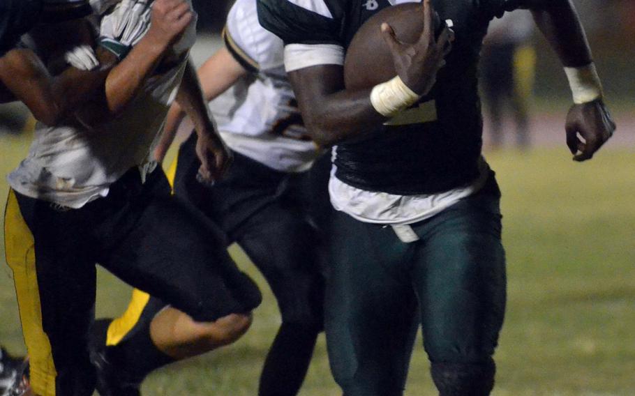 Kubasaki QB Isaiah Johnson outruns the Kadena defense to the end zone.