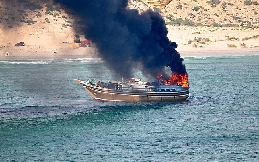 The HNLMS Rotterdam, the flagship for NATO's counter-piracy operation, fired back at a fishing boat near the Somali coast after coming under attack and the boat caught fire. 

