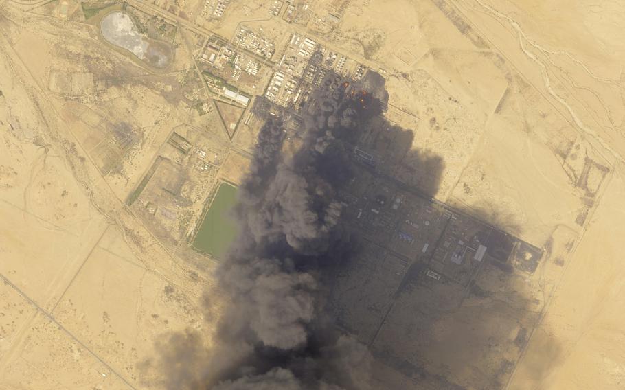 A burning oil refinery in Africa.