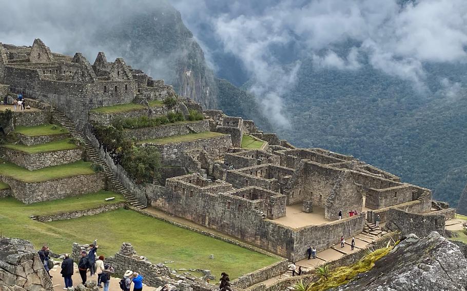 Tourists walk along the paths of the ruins of Machu Picchu in Peru in September 2023. Peru and several other South American countries, along with areas of the Caribbean, are seeing more of the Oropouche virus, the CDC warns.