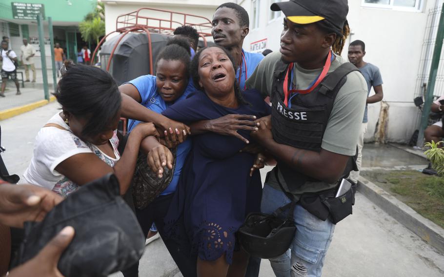 A woman cries in Port-au-Prince, Haiti.