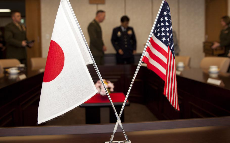 A flag display for a meeting between Commandant of the Marine Corps Gen. Joseph F. Dunford Jr. and Gen. Harukazu Saito, the chief of staff of Japan Air Self-Defense Force, at Tokyo, Japan, March 23, 2015.