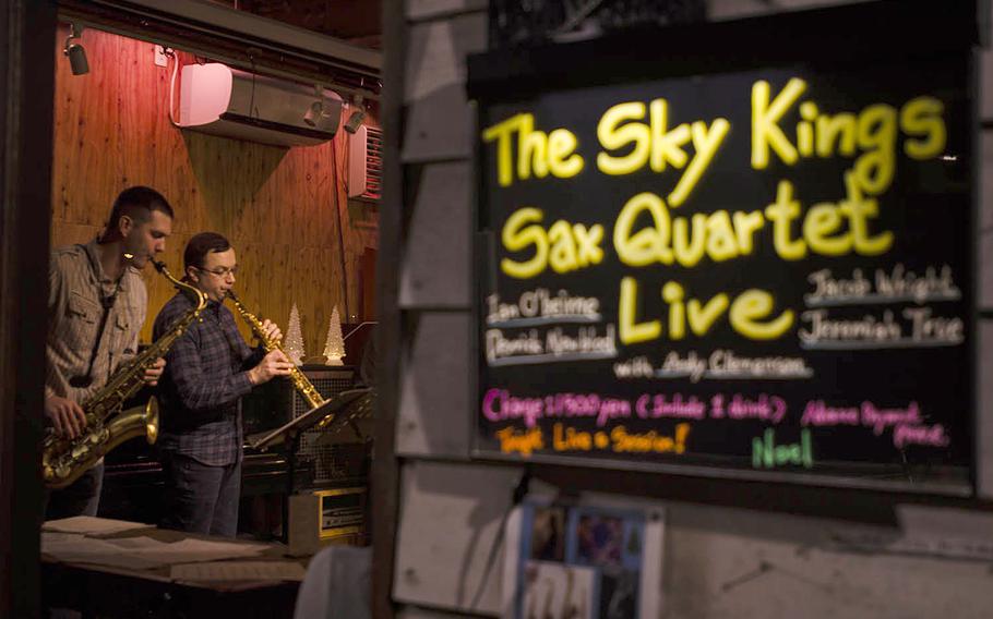 Members of The Sky Kings Saxophone Quartet play at Cafe de Noel for their first gig as a group on Friday, Nov. 30, 2018, near Yokota Air Base, Japan. 