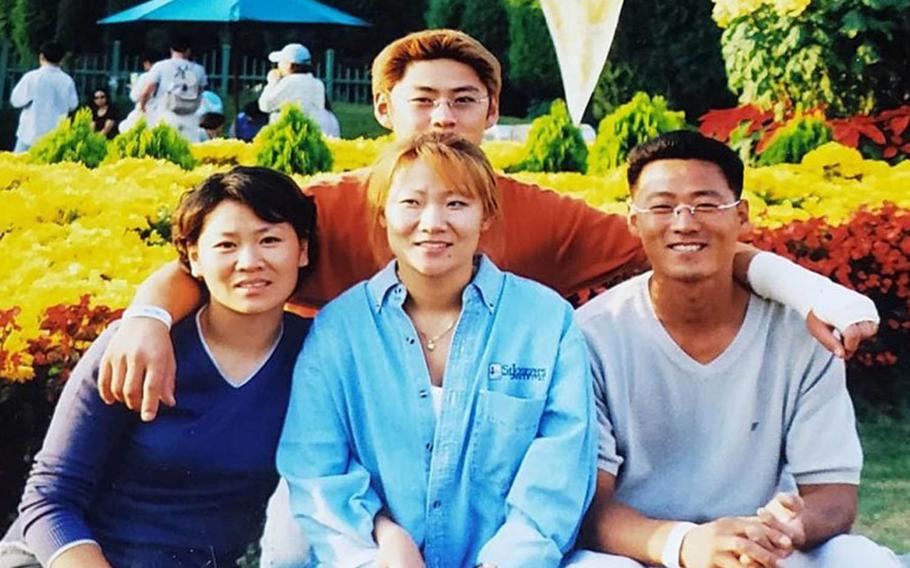 Hyon Chu DuCharme, center, poses with her siblings in this undated family photo.
