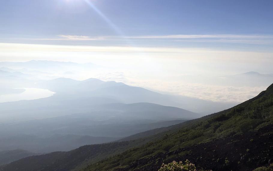 A high-altitude view from a mountain in Japan.