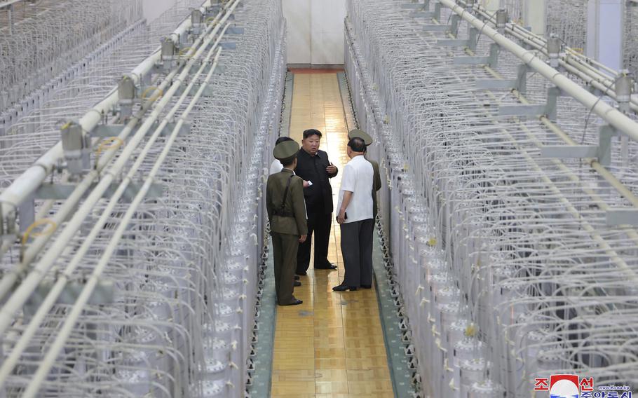 This undated photo provided on Sept. 13, 2024, by the North Korean government shows its leader Kim Jong Un, center, on an inspecting visit at what they say is an institute of nuclear weapons and a facility for nuclear materials at an undisclosed location in North Korea. Independent journalists were not given access to cover the event depicted in this image distributed by the North Korean government. The content of this image is as provided and cannot be independently verified. Korean language watermark on image as provided by source reads: "KCNA" which is the abbreviation for Korean Central News Agency. 