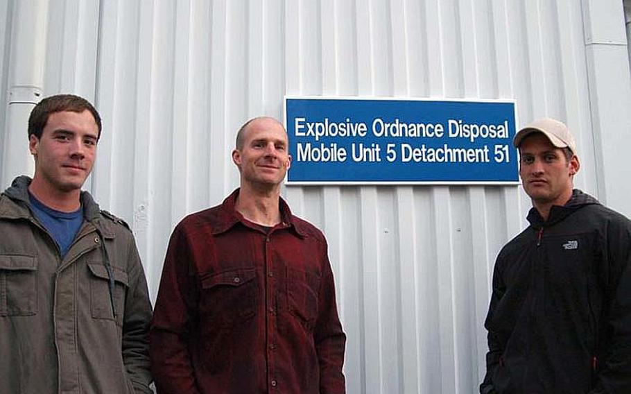 From left to right, Petty Officer 3rd Class Adam Andryc, Petty Officer 1st Class Corey Baughman, and Petty Officer 1st Class Dillon Mudloff, of Explosive Ordinance Disposal Mobile Unit 5, Detachment 51. The trio of bomb technicians saved the life of a Japanese national while climbing Mt. Fuji on Dec. 9-12, 2011. The sailors got more than they bargained for on what turned out to be a harrowing weekend on the mountain. Baughman suffered frostbite staying on the mountain overnight with the man fell. Baughman's efforts helped the man fight off shock and certain death. The man was rescued the next day.