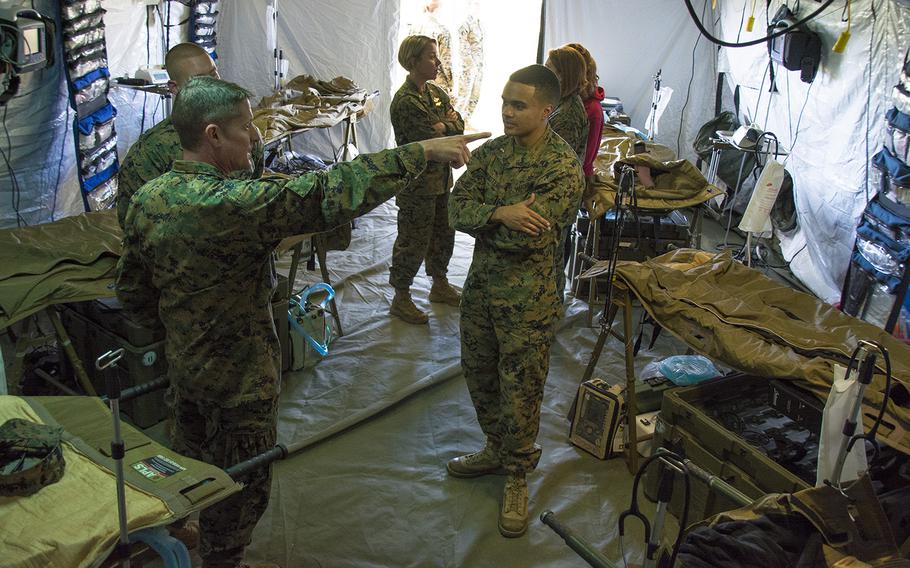 Sailors and Marines assigned to 3rd Medical Battalion showcase their medical capabilities for battlefield environments at Camp Foster, Okinawa, Nov. 27, 2018.
