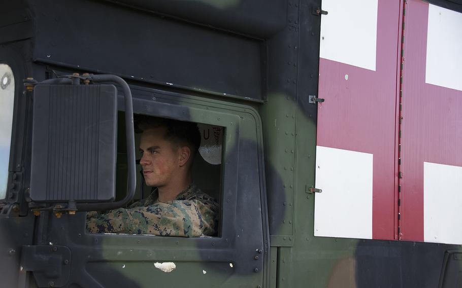 A sailor assigned to the 3rd Medical Battalion drives an ambulance during an exercise at Camp Foster, Okinawa, Nov. 27, 2018.