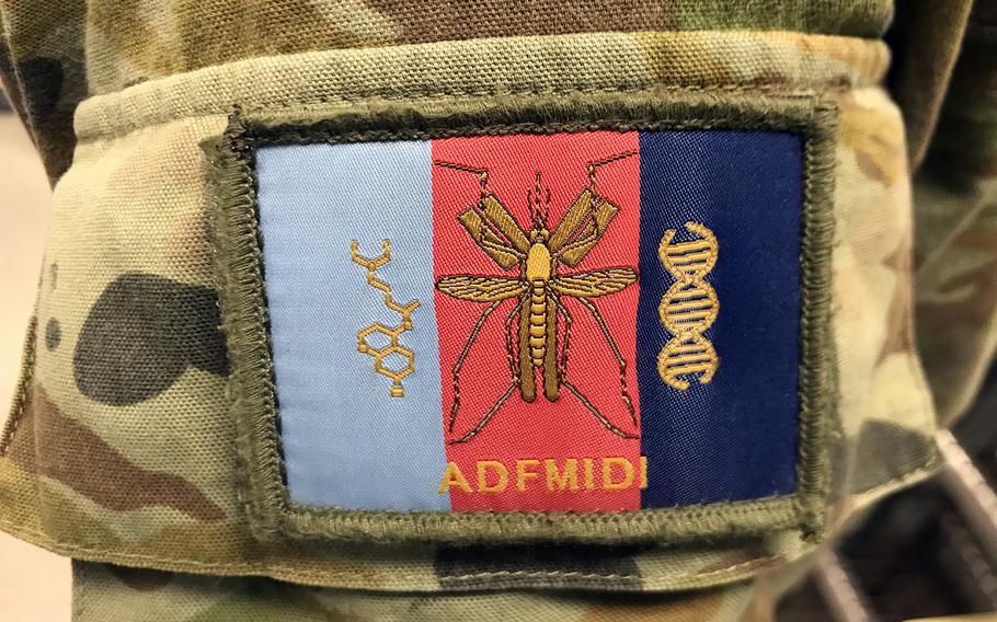 A patch worn by troops serving with the Australian Defence Force's Malaria and Infectious Disease Institute in Brisbane, Australia, is seen Saturday, July 20, 2019.