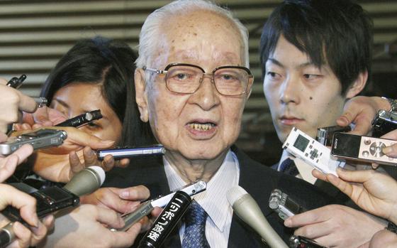 Japanese media mogul speaks to reporters.