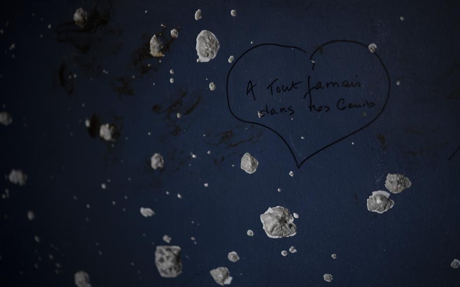 Bullet holes and shrapnel pockmark the wall of a roadside bomb shelter near Sderot, where the police station was stormed during the Oct. 7, 2023, attack by Hamas militants in southern Israel, on Tuesday, Sept. 10, 2024. 