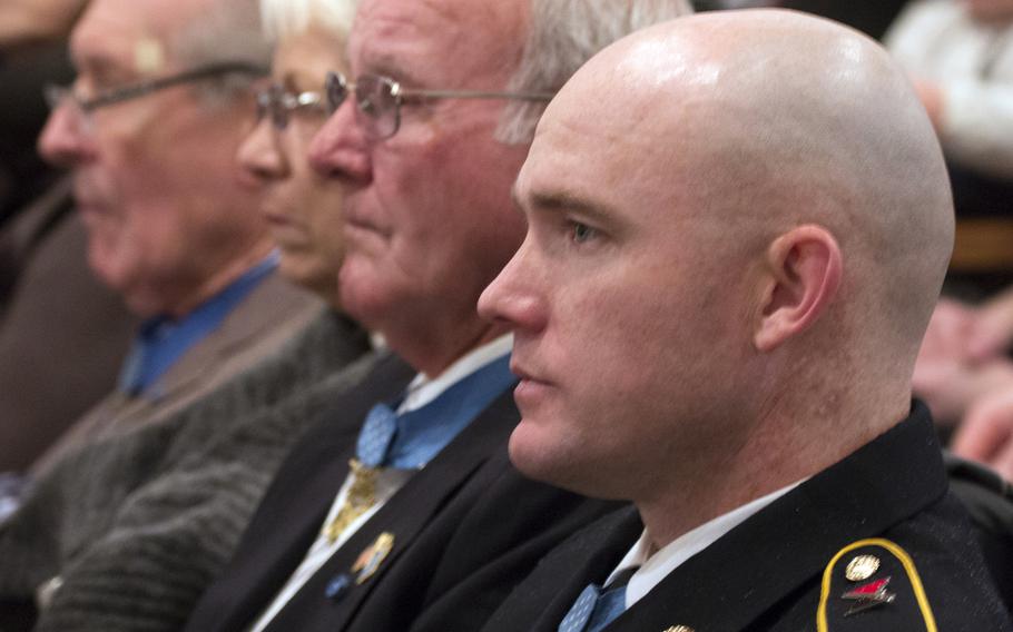 Medal of Honor recipient Ty Carter, foreground, during the Citizen Honors award ceremony at Arlington National Cemetery on Medal of Honor Day, March 25, 2014.