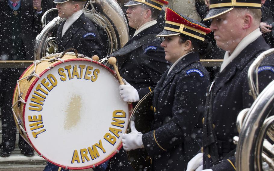 The U.S. Army Band takes part in a wreath-laying ceremony at Arlington National Cemetery on Medal of Honor Day, March 25, 2014.