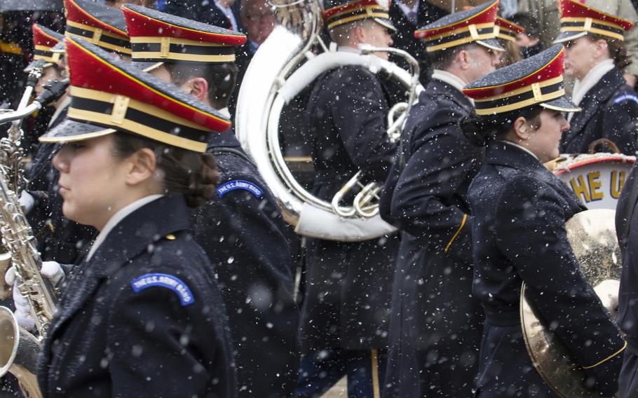 The U.S. Army Band takes part in a wreath-laying ceremony at Arlington National Cemetery on Medal of Honor Day, March 25, 2014.