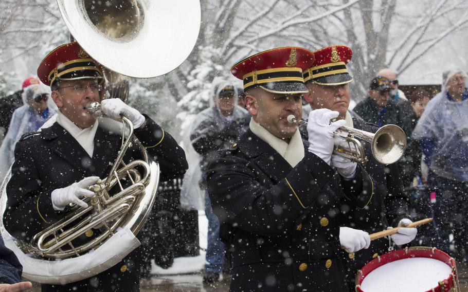 The U.S. Army Band takes part in a wreath-laying ceremony at Arlington National Cemetery on Medal of Honor Day, March 25, 2014.