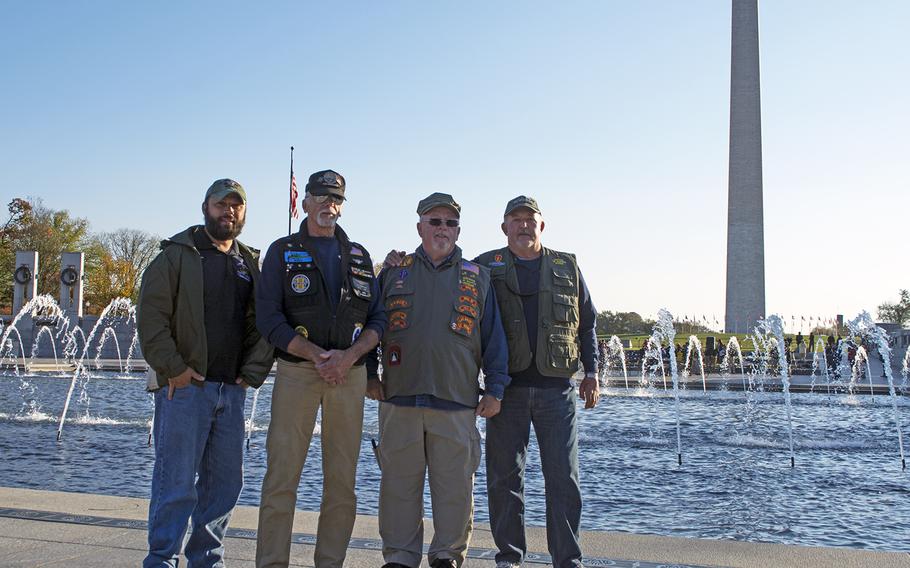 From left to right, DAV members Afghanistan veteran Jess Karcher and Vietnam veterans Gregory Chiapponi, Jim Zane and Mike Varga at the World War II Memorial in Washington, D.C., on Veterans Day, November 11, 2016. 