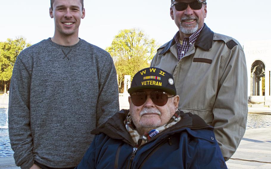 Virginia firefighter Steve Soloduk, top left, poses with his father Warren and his grandfather Fred on Veterans Day 2016 on the National Mall in Washington, D.C. Fred Soloduk, 91-years-old, served in the U.S. Navy on the USS Carter in the Atlantic Theater. Warren Soloduk is retired Coast Guard. 