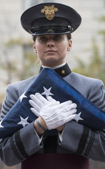 A flag that flew over the U.S. Capitol awaits presentation to Sandra Sinclair Pershing during the groundbreaking ceremony for the National World War I Memorial at Pershing Park in Washington, D.C., Nov. 9, 2017.