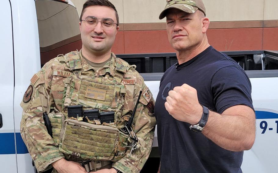 Pennsylvania Air National Guard Tech Sgt. Anthony Williams poses with John Gretton ''Jocko'' Willink, a retired Navy SEAL officer at  Biddle Air National Guard Base, Pa., April 19, 2021. Williams was on duty when Willink paid an impromptu visit to the base.
