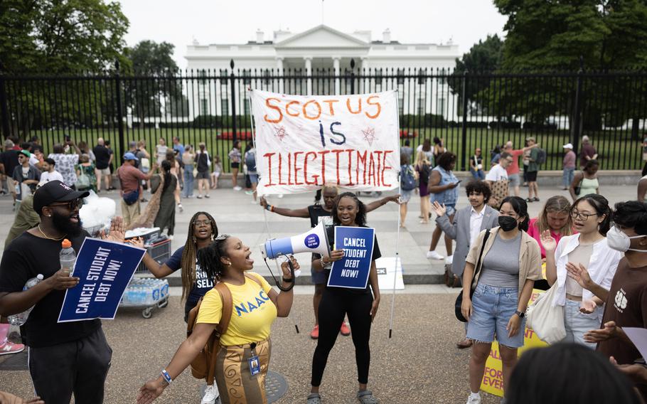 Activists demonstrate outside the White House last Friday after the Supreme Court ruled against President Biden's student loan forgiveness plan.