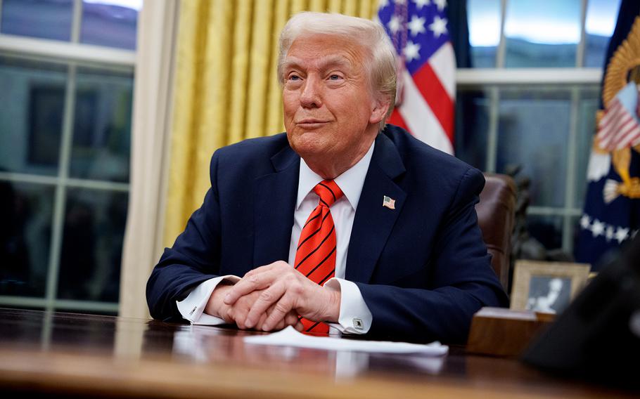 The U.S. president sits at his desk at the White House in Washington.